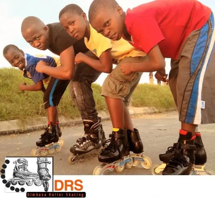 Four young friends posing together on inline skates above the Dimbaza Roller Skating logo